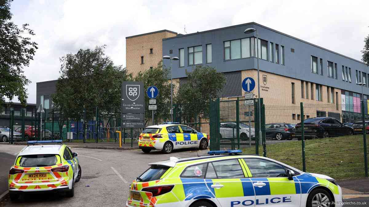 Girl, 14, charged with attempted murder after triple stabbing at Manchester school