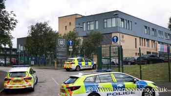 Girl, 14, charged with attempted murder after triple stabbing at Manchester school