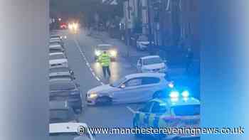Denton road closed as woman de-arrested and taken to hospital after BMW crash