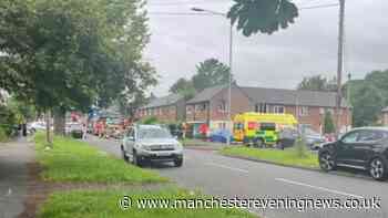 Wythenshawe road taped off after electric bike bursts into flames at house