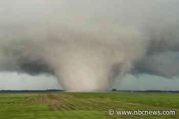 Tornadoes tear through homes and topple power lines in areas outside Chicago