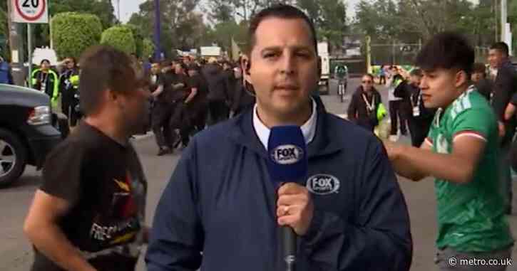 World Cup show interrupted by two Mexico fans throwing punches on live TV