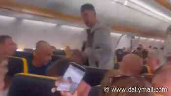 Moment Brit taunts Ryanair passengers when flight to Spanish holiday island is forced to divert to Portugal after chaos on board