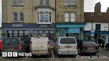 Man dies after being hit by car outside bar