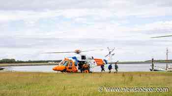Helikopter brengt tien wadlopers in nood aan wal bij Ameland