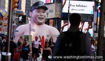Elon Musk protest inflatable appears in Times Square ahead of SpaceX IPO