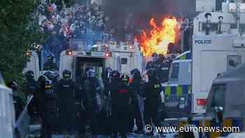 Clashes erupt as police use water cannon near Belfast