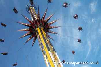 Four people, including two teens, rescued after malfunction strands them 120 feet in the air on Six Flags ride