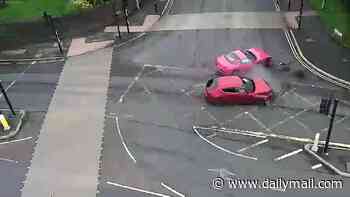 Moment Britain's only pink £120,000 Ferrari owned by 'Barbie-obsessed' woman is sent flying after being hit by car at junction