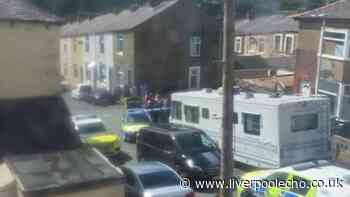 Armed police swarm street after girl, 17, stabbed in neck in Lancashire