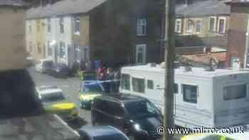 Girl, 17, stabbed in the neck as armed police arrest suspect