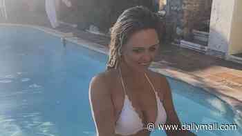 Emily Atack shows off her sizzling figure in a white bikini as she puts on a cheeky display during her hen do ahead of three-day Spanish wedding to Alistair Garner