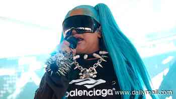 North West, 12, takes the stage in spiked choker and blue pigtails at VERY rowdy music festival… as she gets dad Kanye's stamp of approval