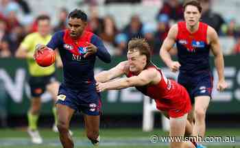 AFL LIVE: Young Eagle helped off after tackle from Roos star; Demons cruise to victory over Dons