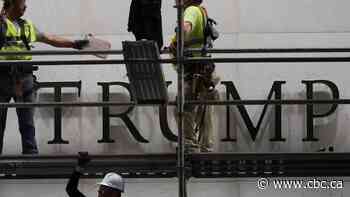 Workers begin removing Trump's name from the Kennedy Center after court order