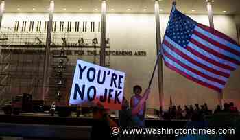 Workers begin removing Trump's name from the Kennedy Center, hours after a court-ordered deadline