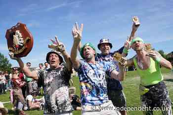 Hundreds flock to Kent village to watch chaotic World Custard Pie Championships