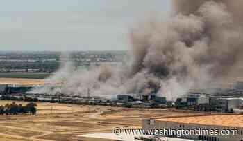 Unhealthy air quality in California city as huge warehouse fire burns for third day