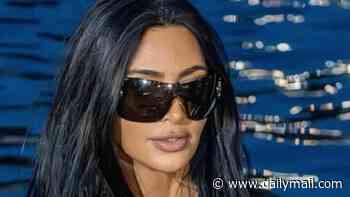 Kim Kardashian continues her Monaco takeover after stealing the show at the Grand Prix with boyfriend Lewis Hamilton as she flaunts her curves in skintight leather