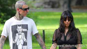Kourtney Kardashian stuns in sheer outfit as she cuddles son Rocky, two, during Central Park ride with Travis Barker