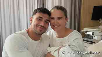 Molly-Mae Hague and Tommy Fury reveal their newborn son's name with it emblazoned onto his boxing gear ahead of Eddie Hall clash