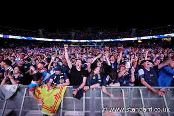 Scotland fans celebrate as first World Cup game in 28 years ends in a win