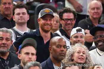 Harry in eighth row at NBA Finals as celebrities watch New York Nicks defeat San Antonio Spurs courtside