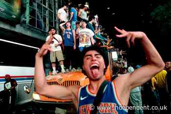 Mayhem mars euphoria as New York City celebrates the Knicks' first championship in 53 years