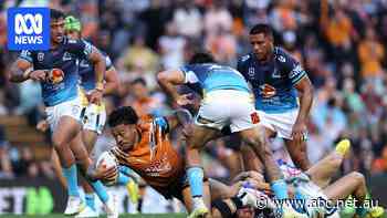 Live: Tigers surging home in Titans thriller at wet and wild Leichhardt Oval