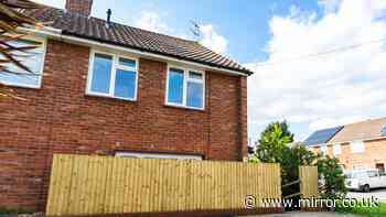 Council rips down fence built across house window after 'mockery'
