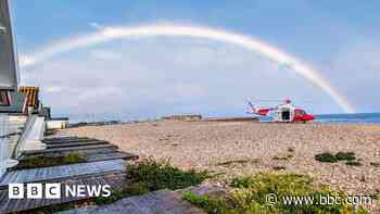 Man stuck on cliffs rescued after waving for help