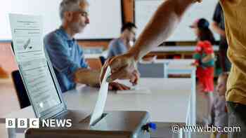Switzerland votes on plan to cap population at 10 million