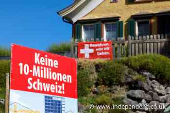 Swiss voters set to reject right-wing’s bid to cap population at 10 million