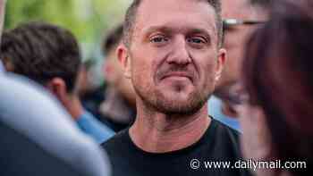 Tommy Robinson detained at Heathrow under terrorism act after Moscow trip with Musk's dad