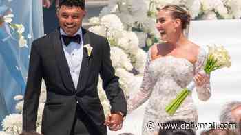 Perrie Edwards and Alex Oxlade-Chamberlain are married! Singer stuns in an elegant white lace gown as she ties the knot with footballer in a picturesque ceremony in Portugal