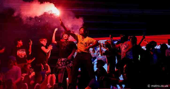 Vehicles set on fire and gunshots ring out in New York hours after World Cup match