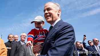 Prime Minister Mark Carney takes questions from reporters