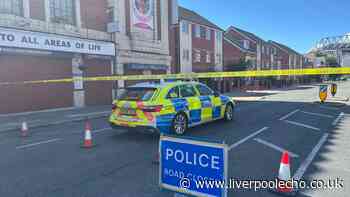 Police cordon off Anfield road as boy, 13, in hospital  - live updates