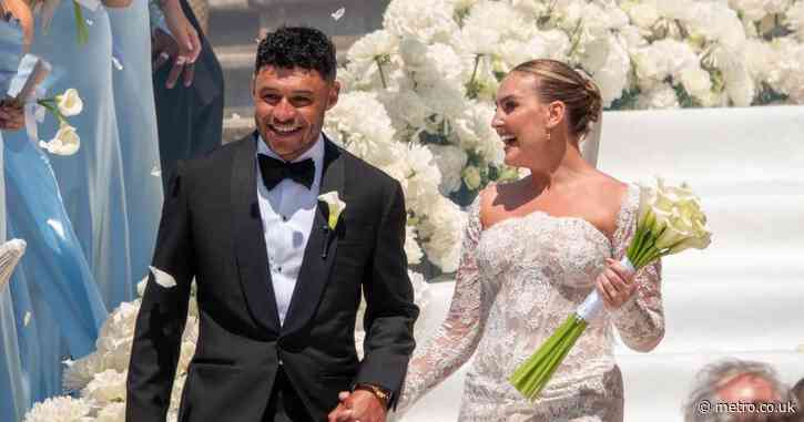 Perrie Edwards glows in lace wedding gown as she marries Alex Oxlade-Chamberlain