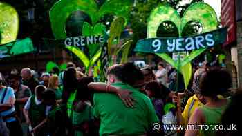 Grenfell survivors and victims' families embrace firefighters at emotional anniversary march