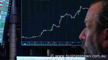 Wall St ends higher as SpaceX's market debut dominates