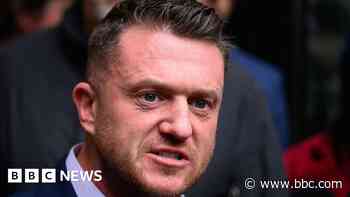 Tommy Robinson says he was stopped at Heathrow by police