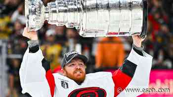 Andersen, Bussi laud one another after raising Cup...