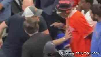 Awkward moment Spike Lee appears to snub Prince Harry as he made solo trip to watch the NBA finals in Texas