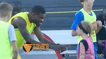 Thomas Partey joins kids' football session in Rhode Island - days after being barred from Canada for Ghana's opening match