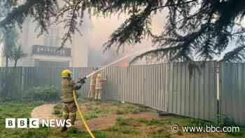Crews remain at derelict building fire