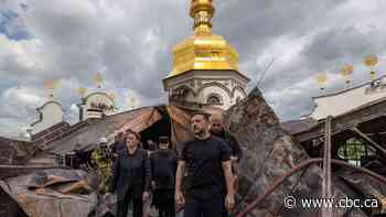 Russian attacks kill 11 across Ukraine, set centuries-old religious site in Kyiv ablaze