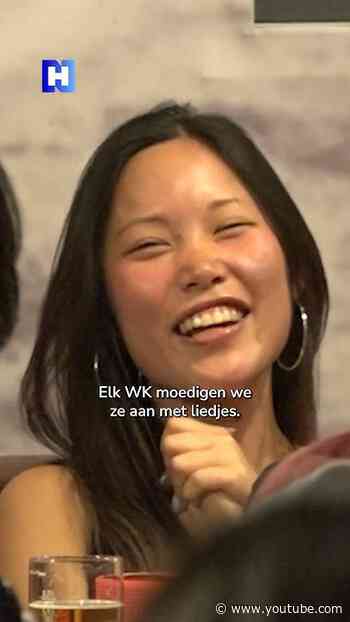 Japanse en Nederlandse voetbalfans kijken samen WK