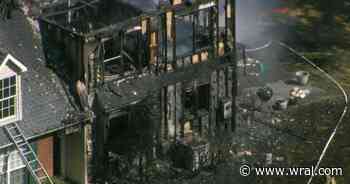 Massive fire rips through Raleigh townhome complex