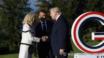 What Trump whispered in Brigitte Macron's ear after fiercely defending her against attacks she's a 'man'